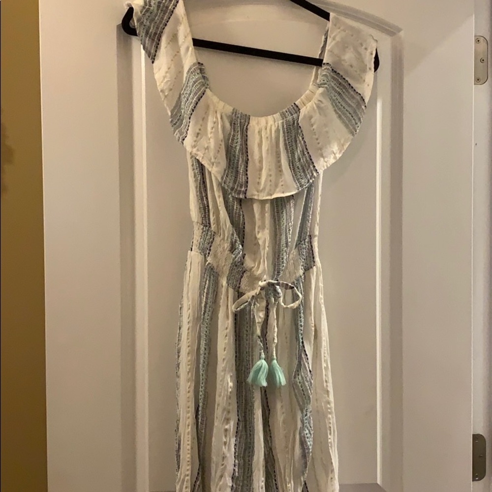 Surf Gypsy White with blue and gold jumpsuit